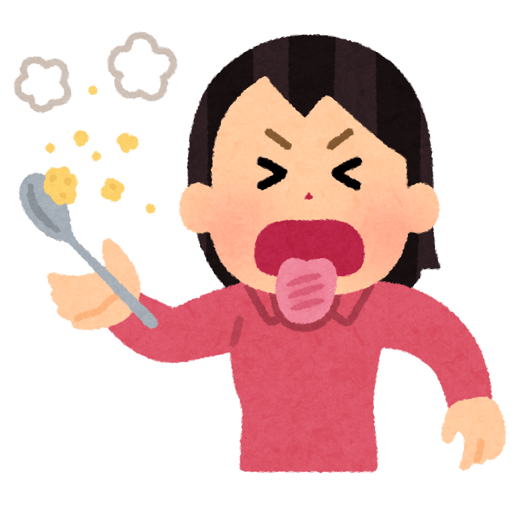 食べ物を熱がる女性